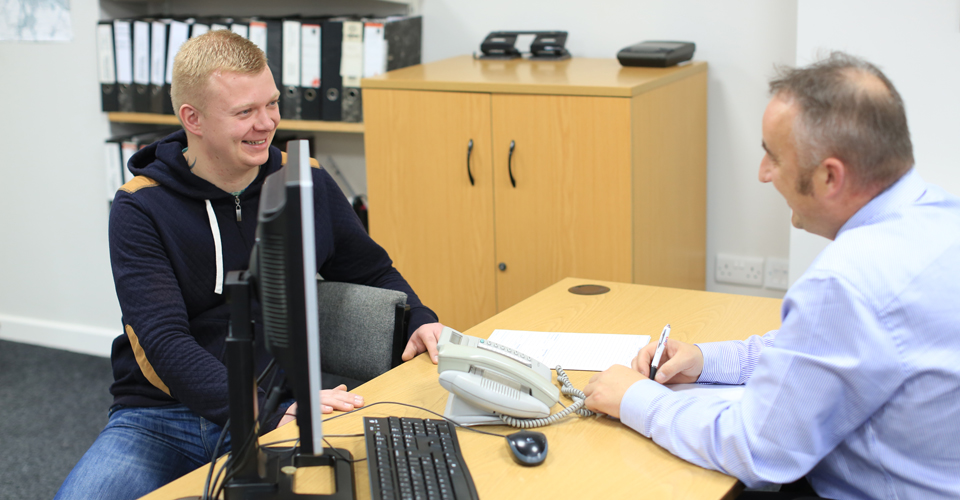 A candidate being interviewed by a member of the Premier Placement Services team